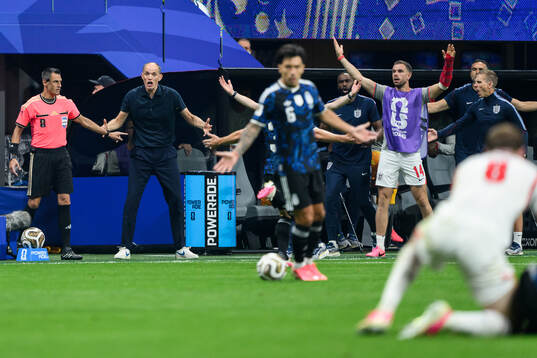 Head coach Thomas Tuchel of England reacts