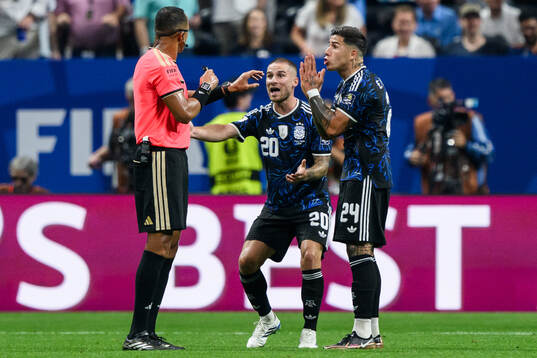 Alexis Mac Allister and Enzo Fernandez of Argentina reacts