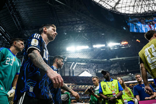 goalkeeper Emiliano Martinez, Lionel Messi and Cristian