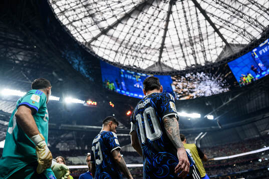 goalkeeper Emiliano Martinez, Cristian Romero and Lionel