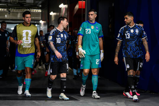 Lionel Messi, goalkeeper Emiliano Martinez and Cristian