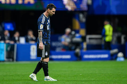 Lionel Messi of Argentina looks dejected