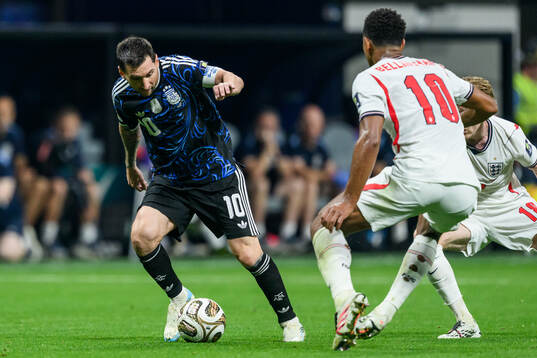 Lionel Messi of Argentina and Jude Bellingham of England