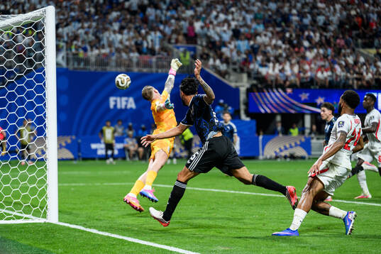 Nico Gonzalez of Argentina and goalkeeper Jordan Pickford