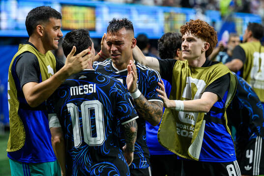 Lionel Messi and Lautaro Martinez of Argentina