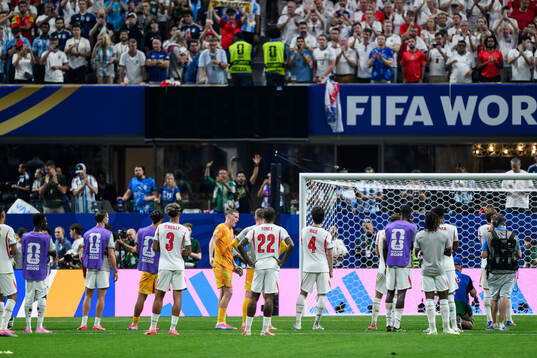 Players of England look dejected
