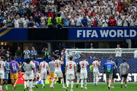 Players of England look dejected