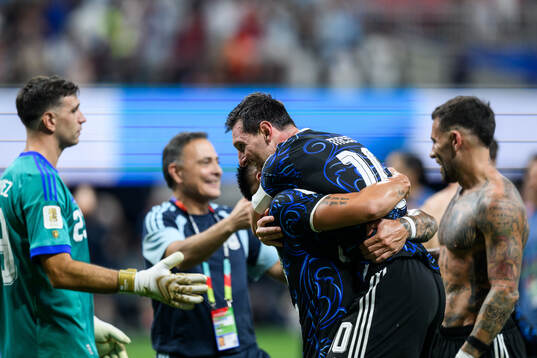 Lautaro Martinez and Lionel Messi of Argentina celebrate