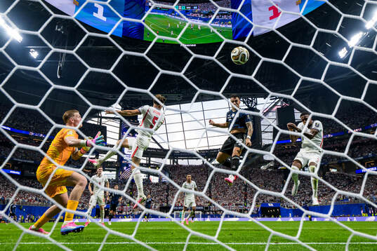 Lautaro Martinez of Argentina scores the 1-2 goal behind