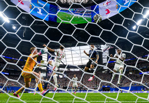 Lautaro Martinez of Argentina scores the 1-2 goal behind