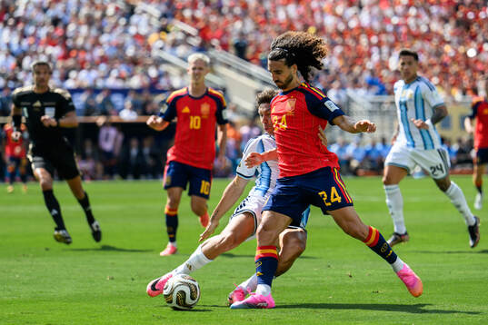 Gonzalo Montiel of Argentina and Marc Cucurella of Spain