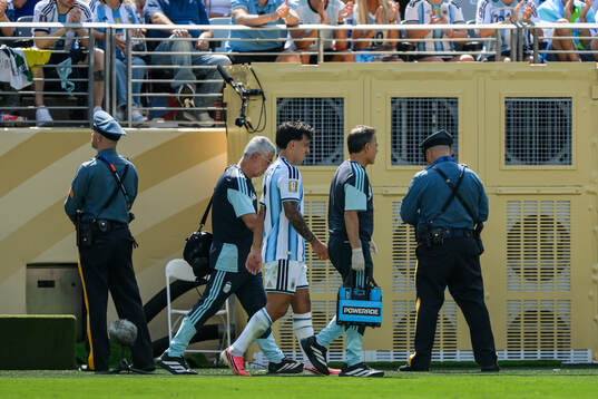 of Argentina Lisandro Martinez leaves the pitch with an