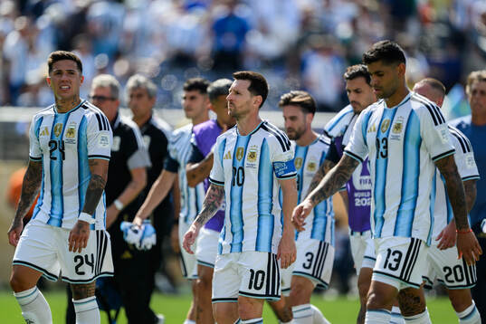 Enzo Fernandez Lionel Messi and Cristian Romero of