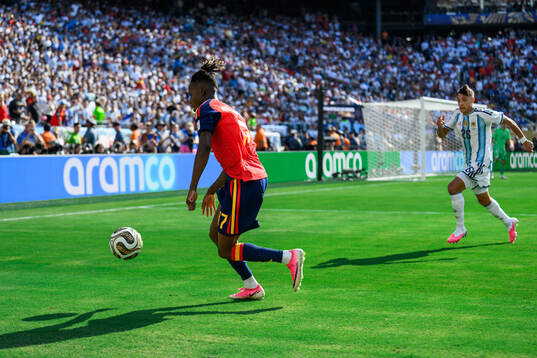 Nico Williams of Spain and Nahuel Molina of Argentina