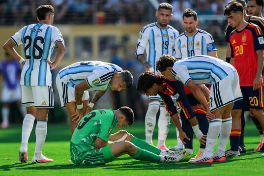 goalkeeper Emiliano Martinez of Argentina in pain