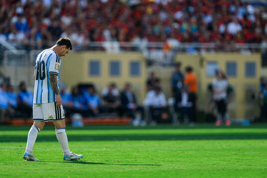 Lionel Messi of Argentina looks dejected