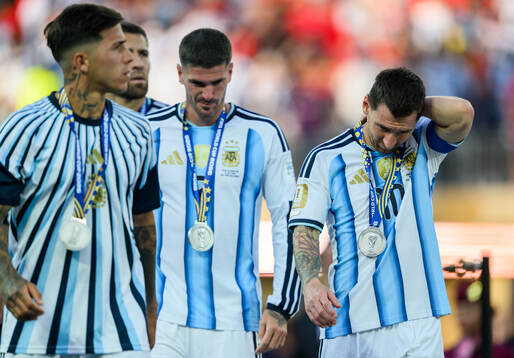 Rodrigo De Paul and Lionel Messi of Argentina look dejected