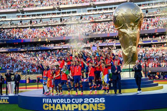 Rodri of Spain hoists the trophy