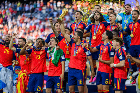 Rodri of Spain hoists the trophy