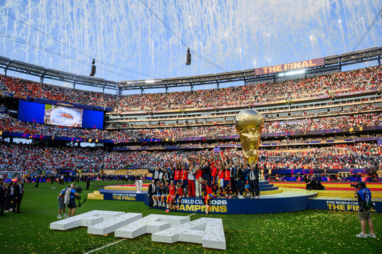 Rodri of Spain hoists the trophy