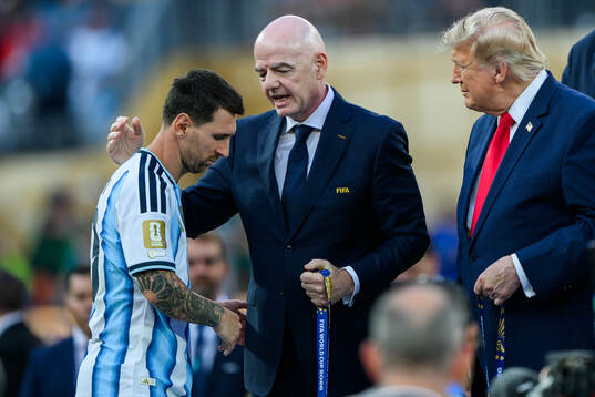 Lionel Messi of Argentina with Gianni Infantino, President