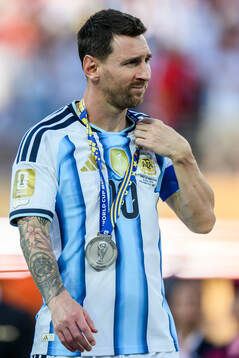 Lionel Messi of Argentina looks dejected