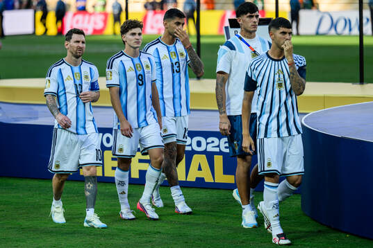 Lionel Messi, Julian Alvarez and Cristian Romero of