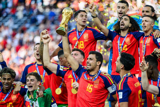 Rodri of Spain hoists the trophy