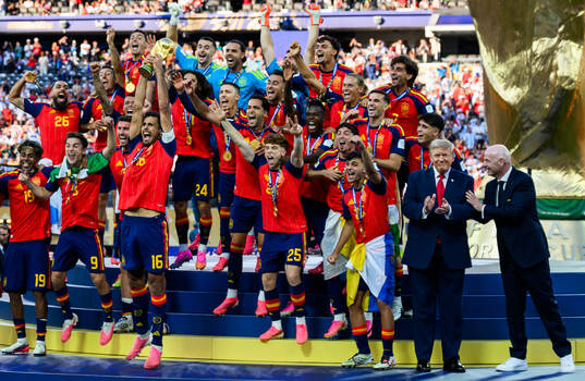 Rodri of Spain hoists the trophy