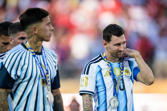 Lionel Messi of Argentina looks dejected