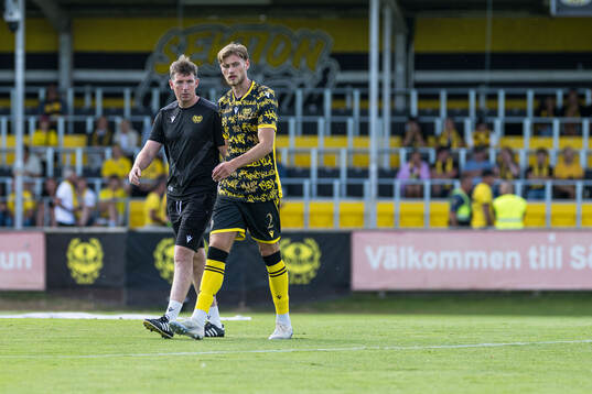 Assistant coach Gerard Nash and Ludvig Svanberg of Mjällby