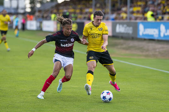 Julliani Eersteling of Lincoln Red Imps and Elliot Stroud