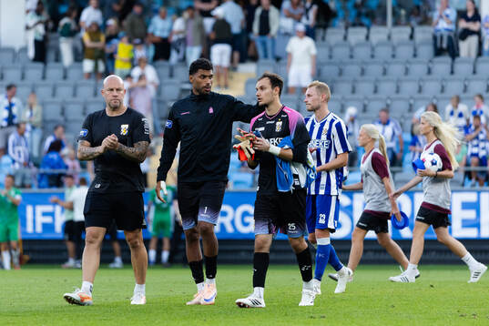 Goalkeeper coach Lee Baxter, goalkeeper Jonathan Rasheed