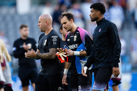 Goalkeeper coach Lee Baxter, goalkeeper Jonathan Rasheed