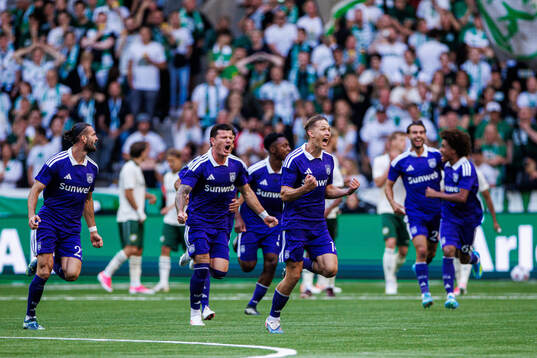 Danylo Sikan of Anderlecht celebrates