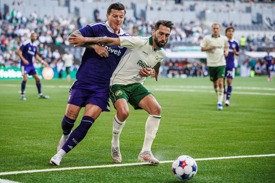 Giulian Biancone of Anderlecht and Nahir Besara of Hammarby