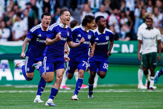 Danylo Sikan of Anderlecht celebrates