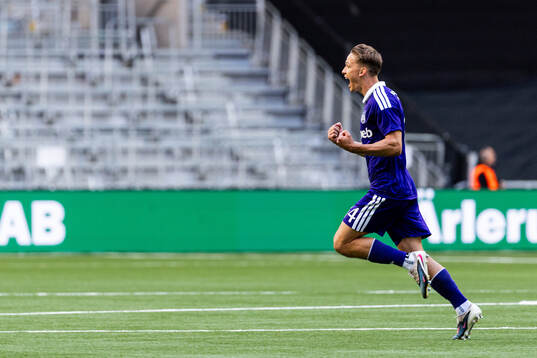 Danylo Sikan of Anderlecht celebrates