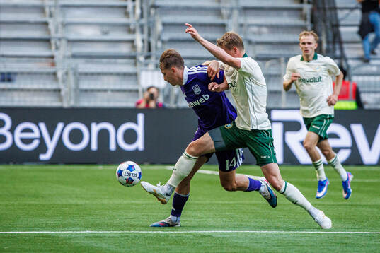 Danylo Sikan of Anderlecht and Victor Eriksson of Hammarby