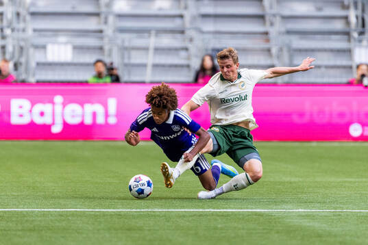 Joshua Nga Kana of Anderlecht and Frederik Winther of