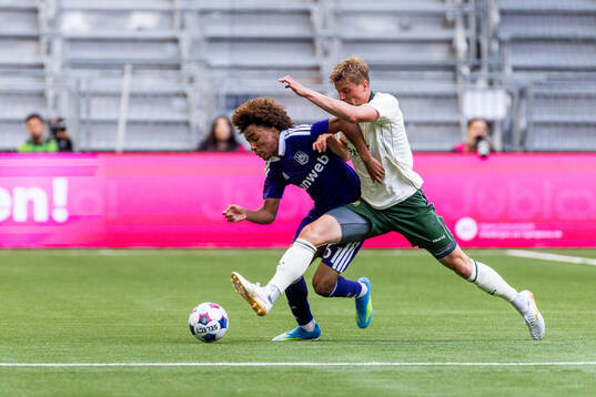 Joshua Nga Kana of Anderlecht and Frederik Winther of