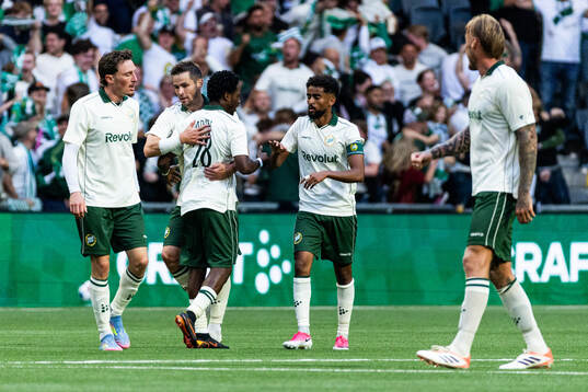 Frank Junior Adjei of Hammarby celebrates with team