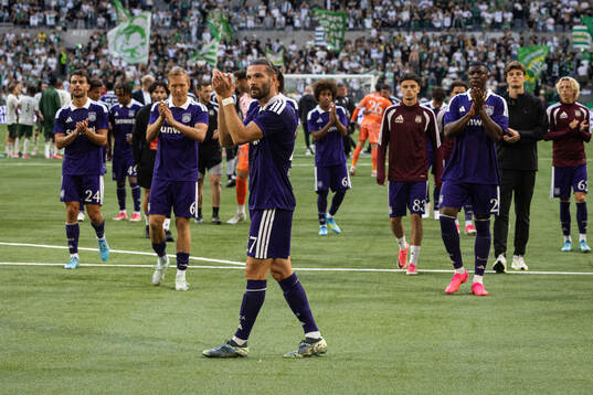 Leo Petrot of Anderlecht thanks supporters