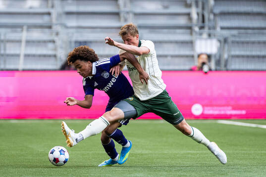 Joshua Nga Kana of Anderlecht and Frederik Winther of