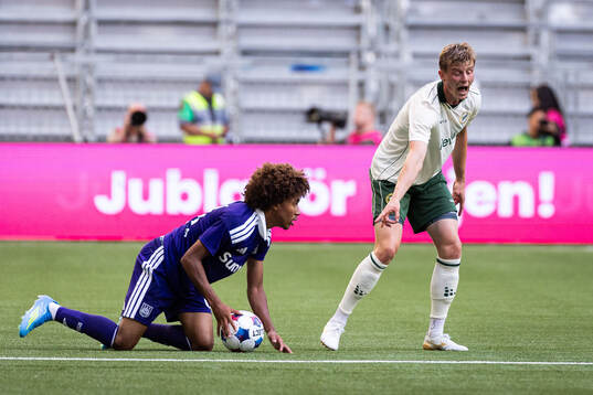 Joshua Nga Kana of Anderlecht and Frederik Winther of