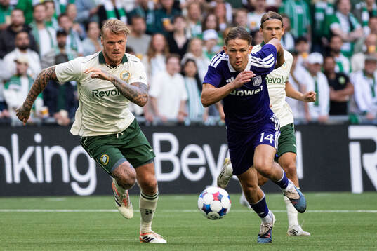 Victor Eriksson of Hammarby and Danylo Sikan of Anderlecht