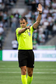 Referee Donald Robertson