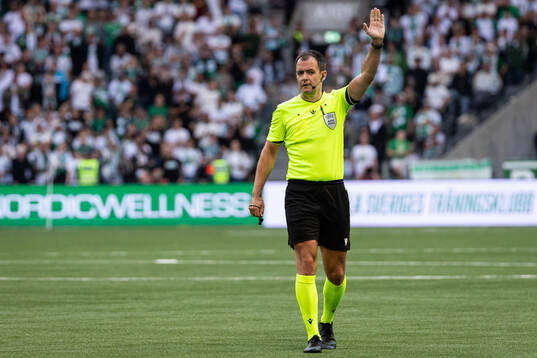 Referee Donald Robertson