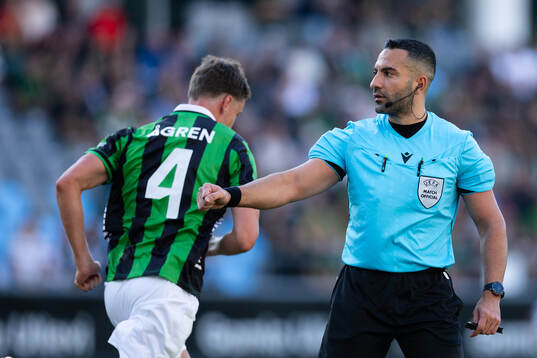 Referee Peiman Simani
