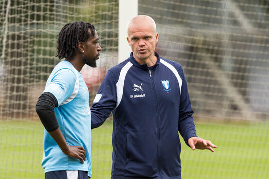 Warren Kamanzi och huvudtränare Gaute Helstrup